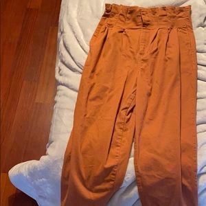 Super stylish rusty color pants.